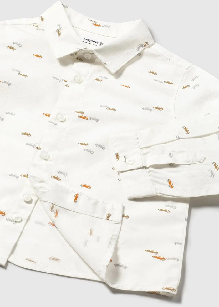 Closeup of Mayoral baby boy shirt showing animal print, button front, collar, and soft cotton detail.