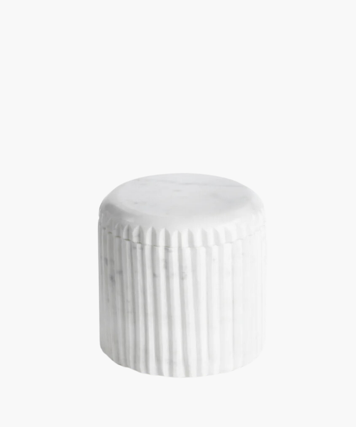A white marble container with fluted design and curved details, suitable for bathroom accessories. | Wildwood Home Co.