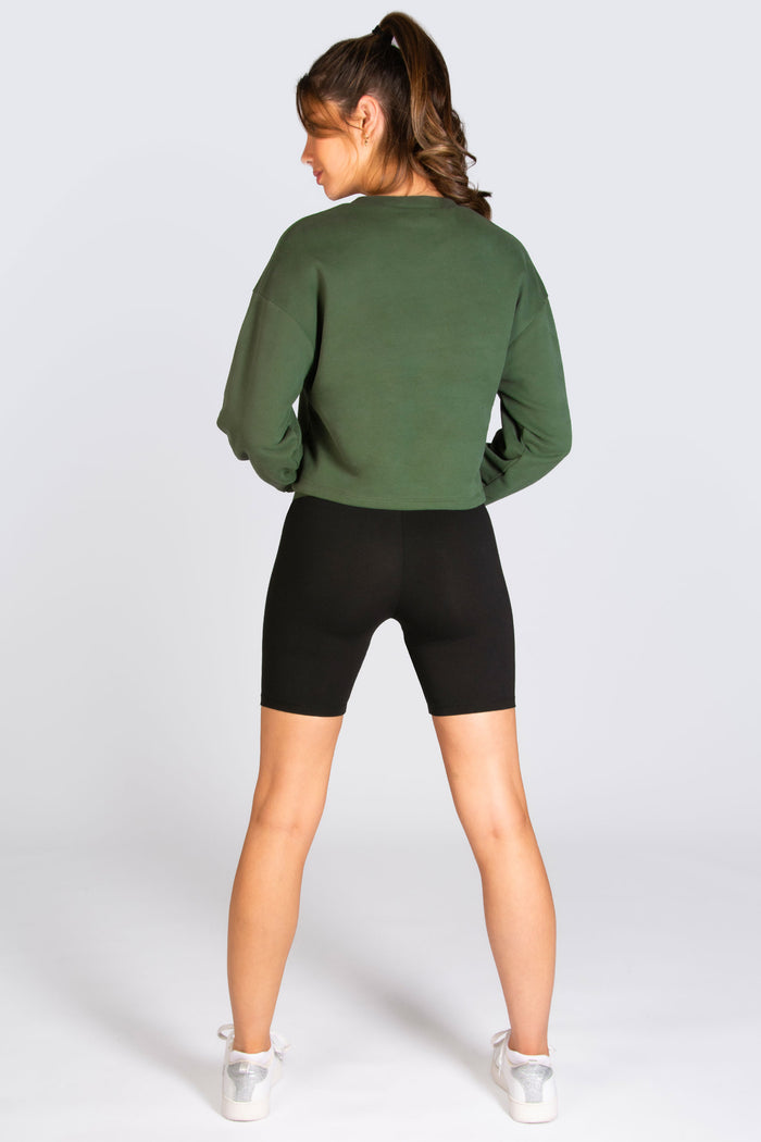 Pineapple high waisted shorts for women worn with khaki crop sweater by Pineapple.