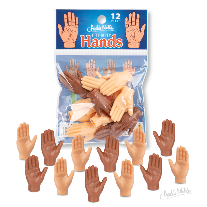 A bag of twelve Itty Bitty Hands—soft vinyl mini hands in assorted skin tones—with several novelty toy hands shown outside the package.
