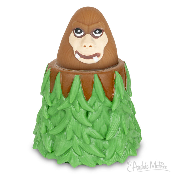 The Surprise Popping Bigfoot, with its rubber design featuring a gorilla shape and a tree-like green base, makes the perfect toy for imaginative play.