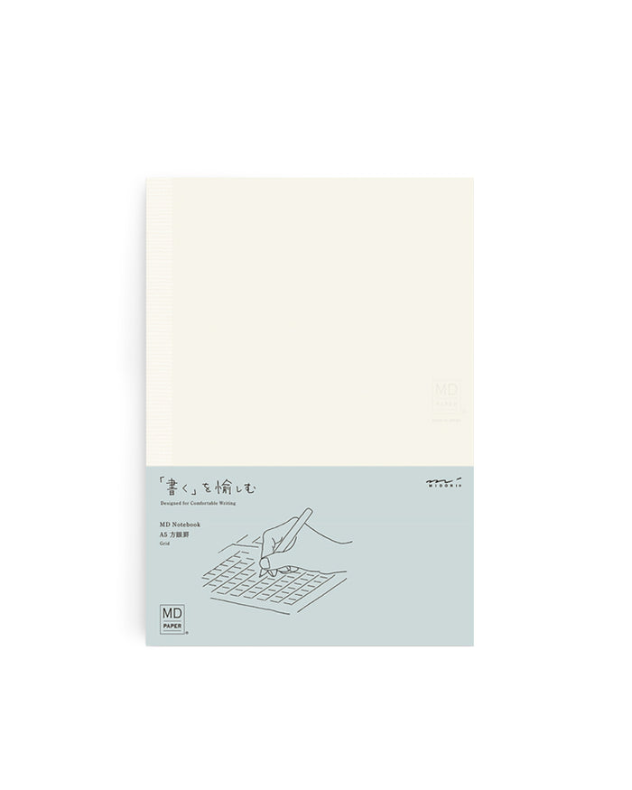 Silhouetted midori square grid thick a5 notebook against white background.