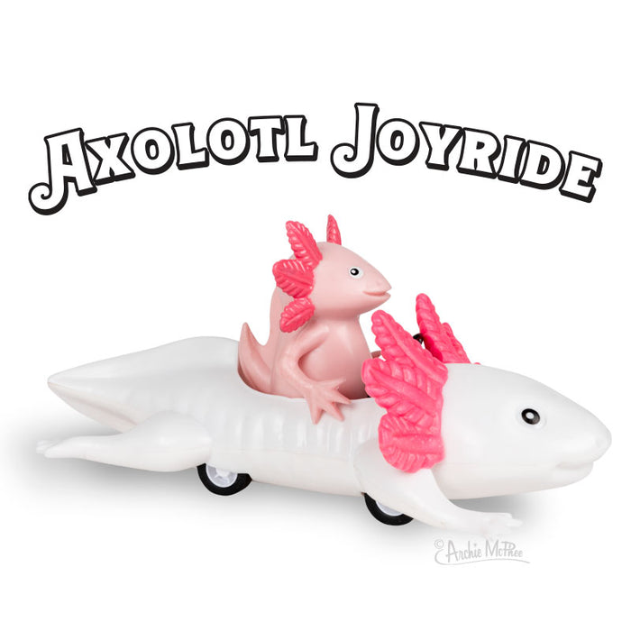 The Axolotl Joyride, a charming pink axolotl toy made from soft vinyl, is having fun riding on a larger wheeled axolotl.