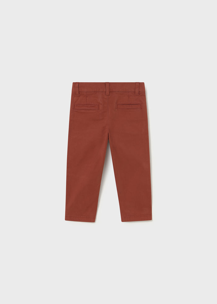 Back view of Mayoral baby boy Rust Brown chinos with clean solid color and straight leg shape.
