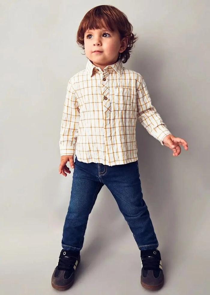 Toddler wearing Mayoral baby boy jeans with a shirt for a polished everyday outfit.