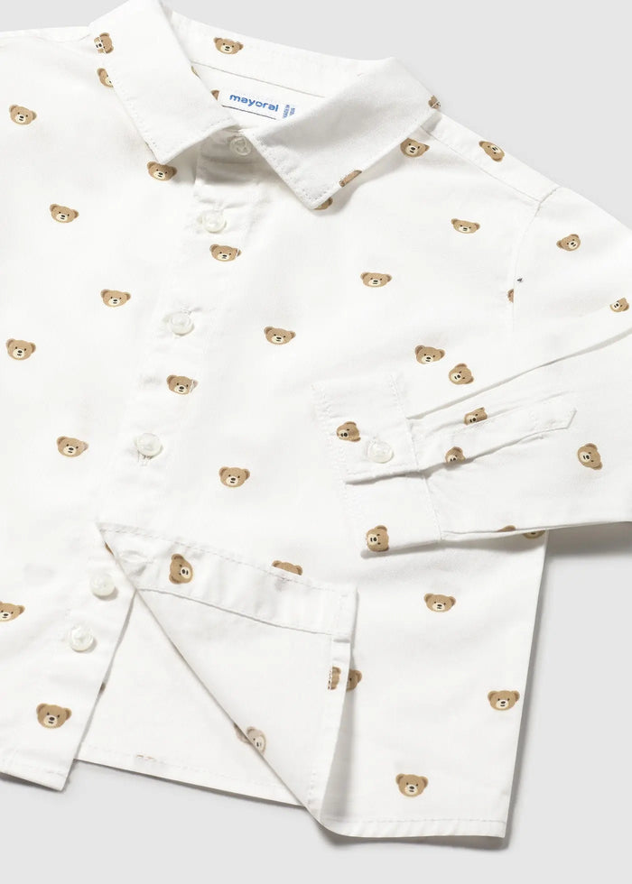 Closeup of Mayoral baby shirt showing collar, button placket, cuff, and printed cotton fabric.