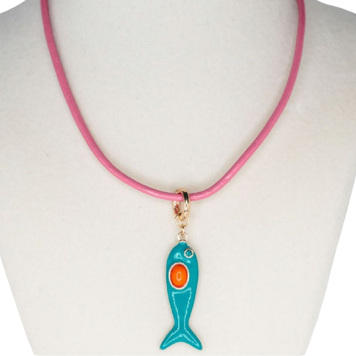 Necklace with a blue fish pendant on a mannequin