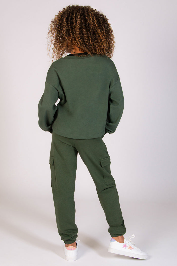 Oversized cargo joggers in green for kids dance classes