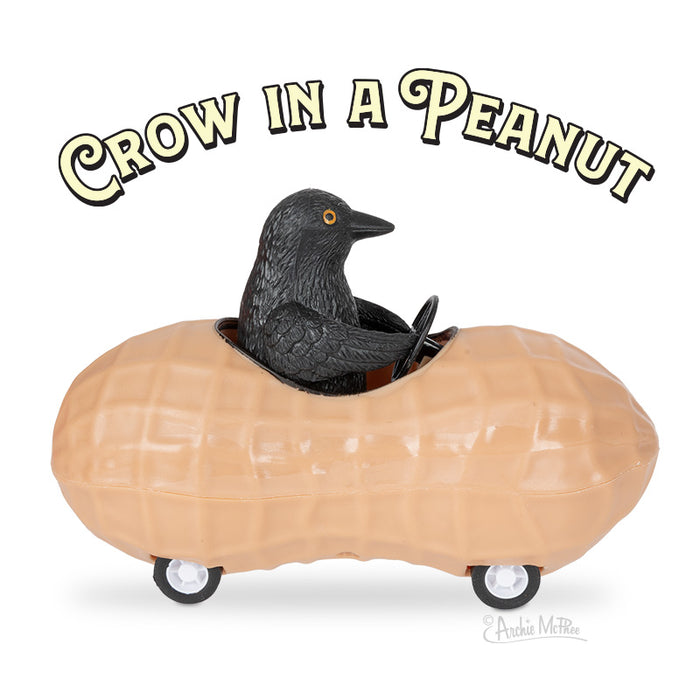 The product named "Crow in a Peanut" features a toy crow riding in a soft vinyl peanut-shaped car complete with wheels.