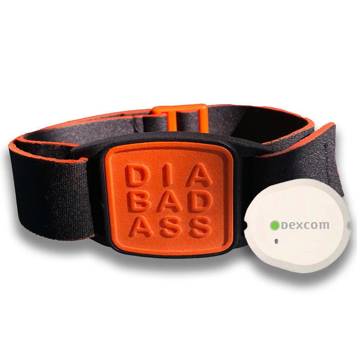 Dexband CGM armband in orange with DIABADASS cover. Shown with Dexcom G7 CGM. LML4016, LML4023, LML4030, LML5006.