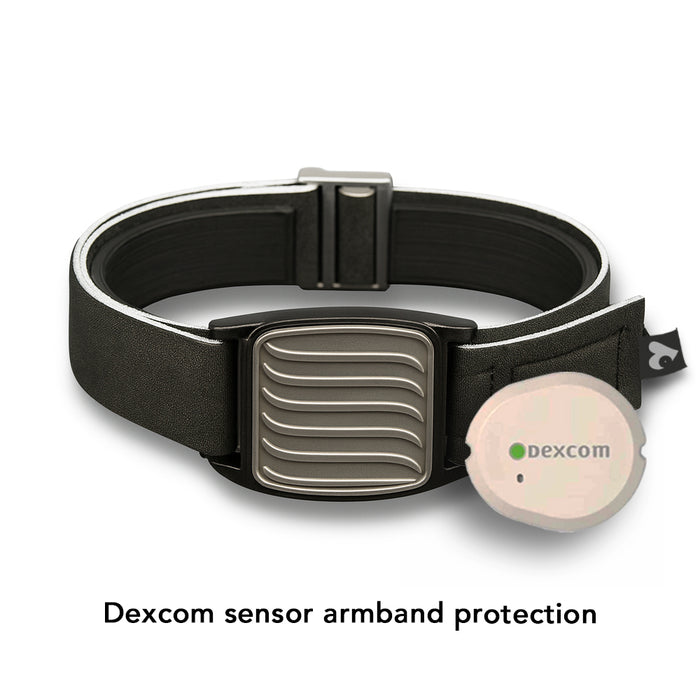 Dexband armband for Dexcom G7 CGM. Pewter cover with Wave design. Shown with Dexcom G7 sensor. LML3958, LML3965, LML3972, LML5037.