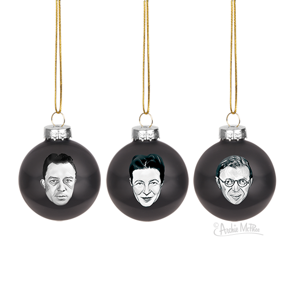 The set includes three Existentialist Ornaments in black, each adorned with illustrated faces and a gold string for hanging.