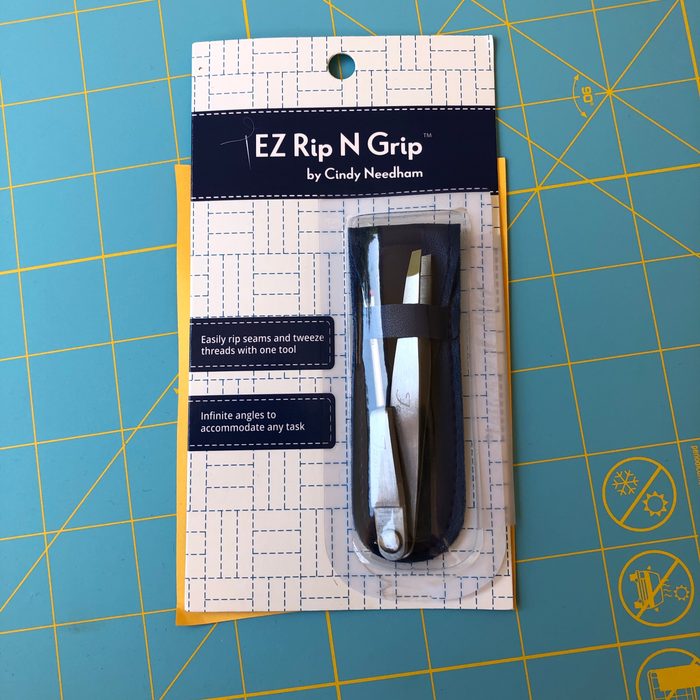seam ripper with tweezers pivot with a case