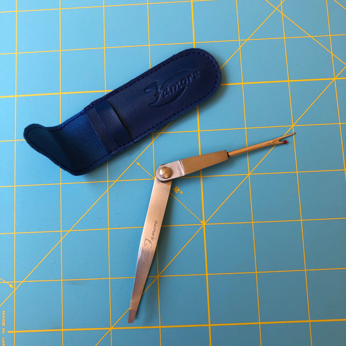 seam ripper with tweezers pivot with a case