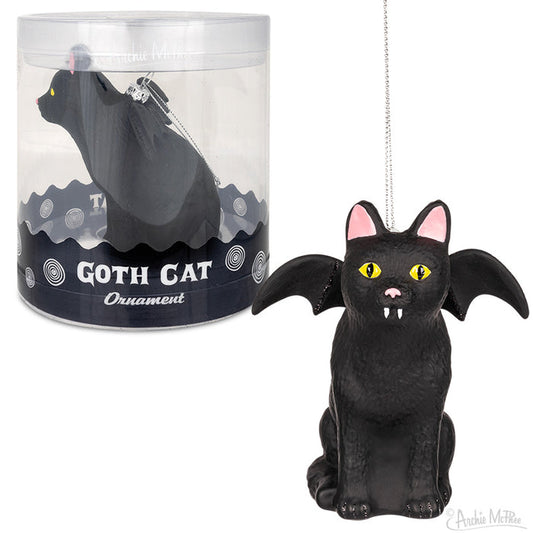 The Goth Cat Ornament, featuring fangs and bat wings, is ideal for your Christmas display and is displayed alongside its packaging.