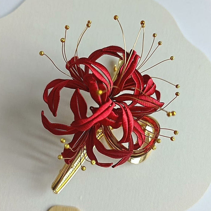Luxury 3D embroidery hair accessory depicting a red Lycoris flower made with intricate artisanal thread-wrapping.