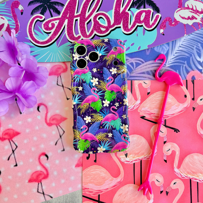 It's Giving Flamingo Wavy Luxe MagSafe iPhone case styled with a pink Aloha sign, orchid and flamingo backdrop.