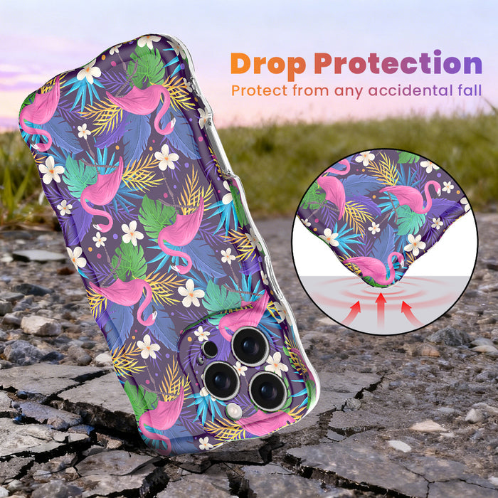 Trendy wavy iPhone case featuring vibrant pink flamingos, emerald palm fronds, and white flowers on a dark purple background with a high-gloss finish.