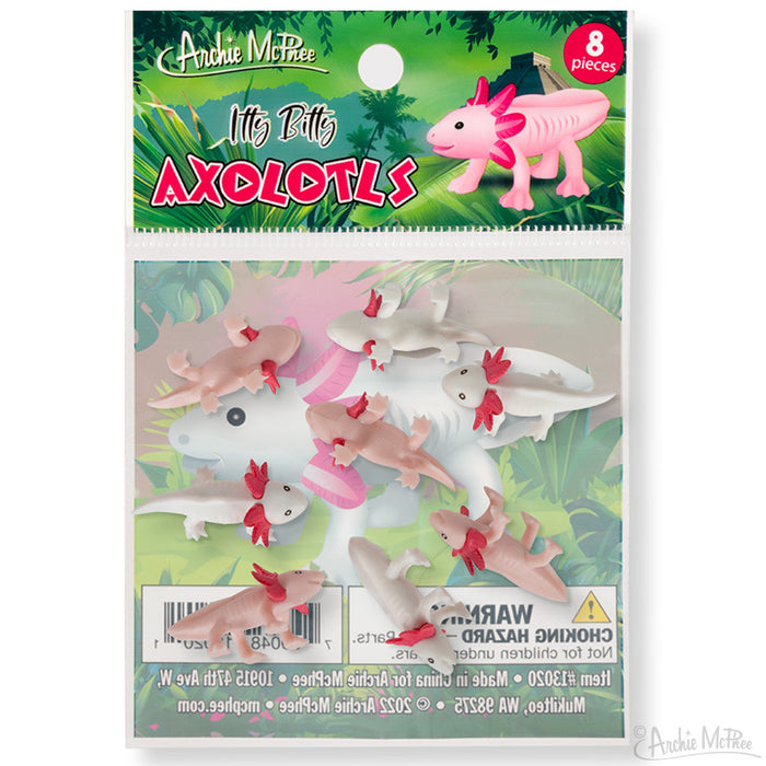 The Itty Bitty Axolotls come as an assortment of pink and white miniature figures, packaged in a beautifully illustrated bag against a charming backdrop.