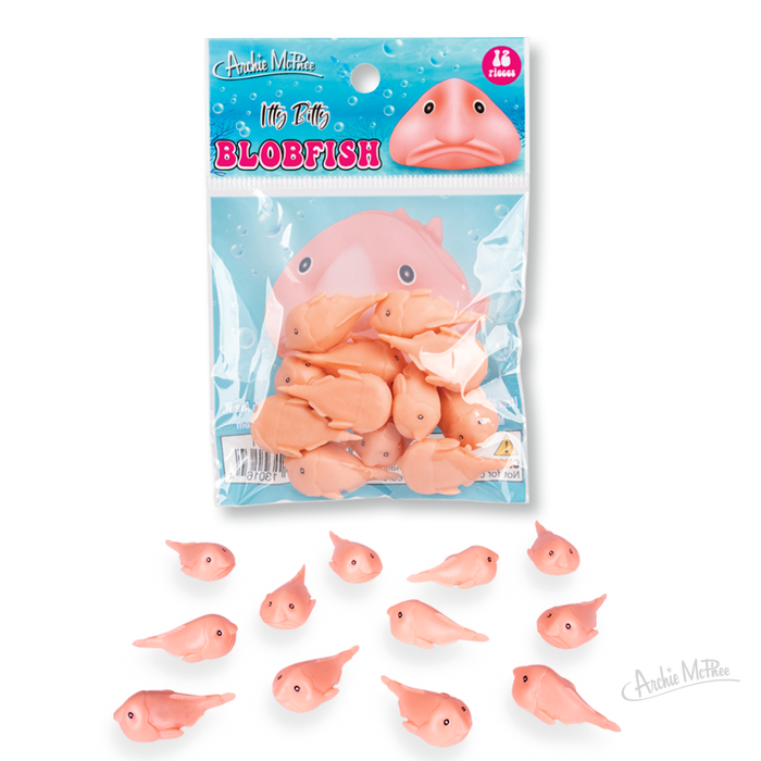 A package of Itty Bitty Blobfish soft vinyl toys, with several loose pink blobfish displayed beneath the packaging.