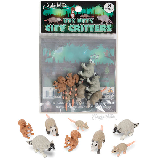 This package, labeled Itty Bitty City Critters, includes small vinyl animals such as raccoons, squirrels, and pigeons, reflecting the charm of city wildlife.
