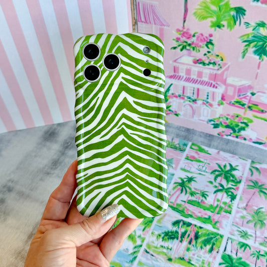 Trendy palm green and white wavy iPhone case featuring a bold zebra print pattern with a high-gloss finish.