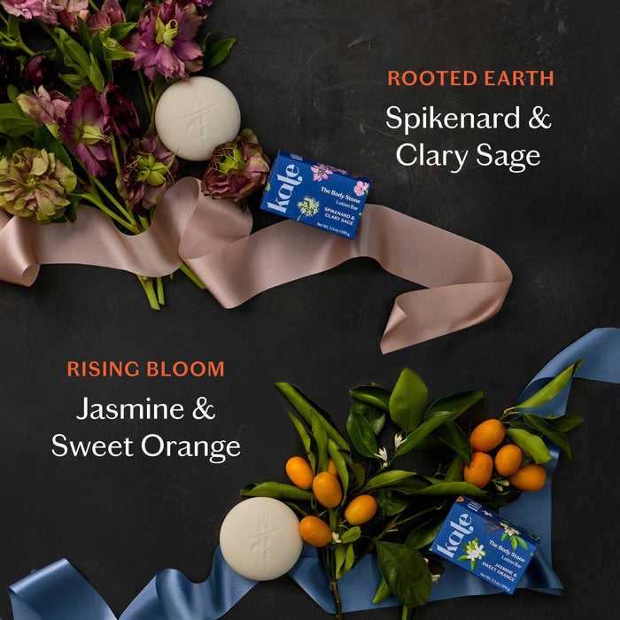 Two soap bars with floral and fruit decorations on a dark background, featuring 'Rooted Earth' and 'Rising Bloom' scents.