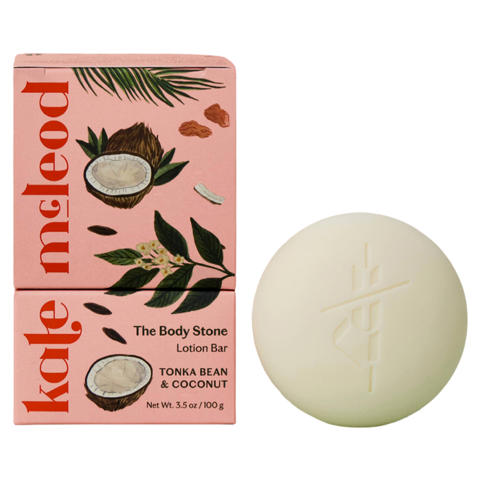 Kale McLeod lotion bar with packaging featuring coconut and leaf design on a white background