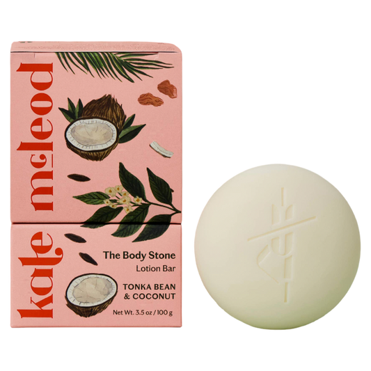 Kale McLeod lotion bar with packaging featuring coconut and leaf design on a white background
