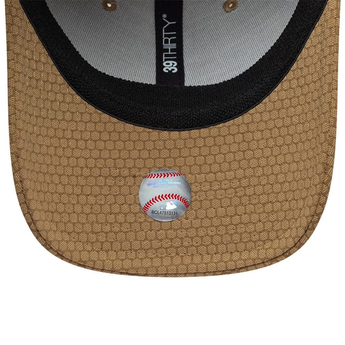 Pictured is this MLB Tech LA Dodgers 39THIRTY Stretch Fit cap in Beige. 7