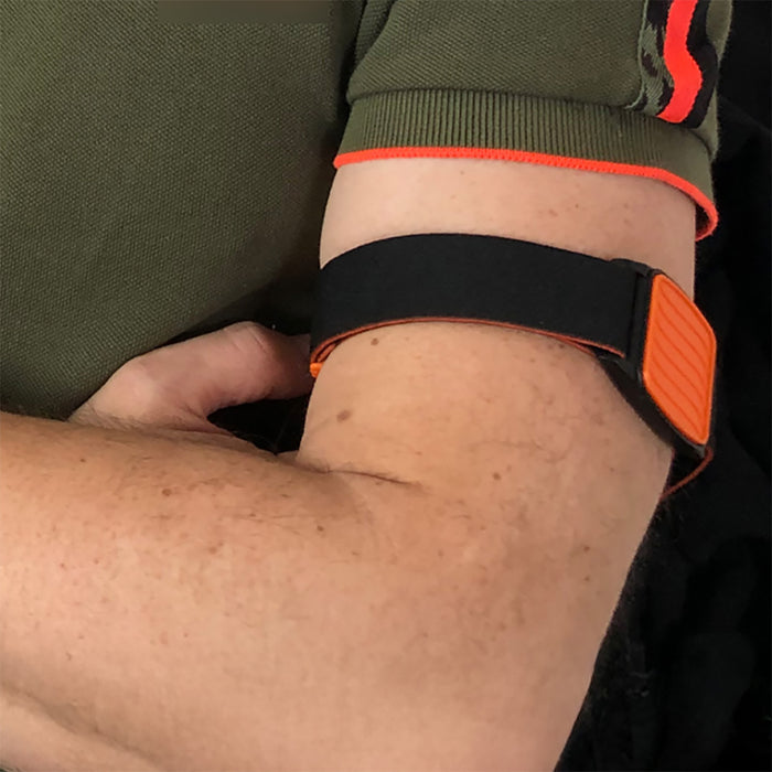 Libreband CGM armband orange wave cover close-up, compatible with FreeStyle Libre 2, showing wave design detail. LML4597, LML2975, LML2258, LML2265.