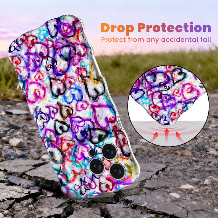 Trendy wavy iPhone case featuring a vibrant street-art collage of neon spray-paint hearts with a high-gloss finish.