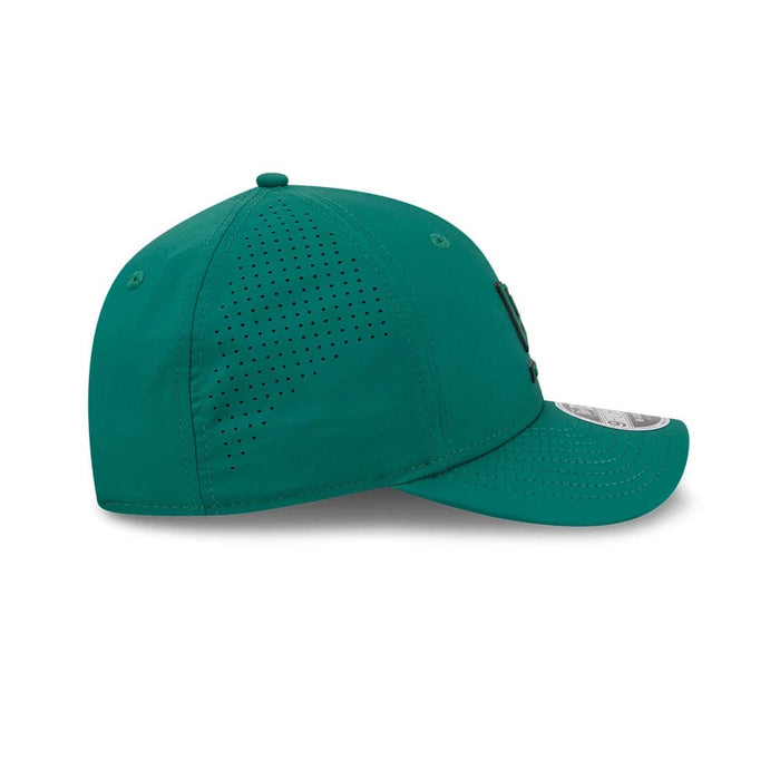 Pictured is this New Era Golf 9FORTY M-Crown cap in green. 6