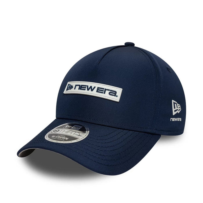 Pictured is this New Era Rubber Patch 39THIRTY M-Crown A-Frame Stretch Fit cap in dark blue. 1