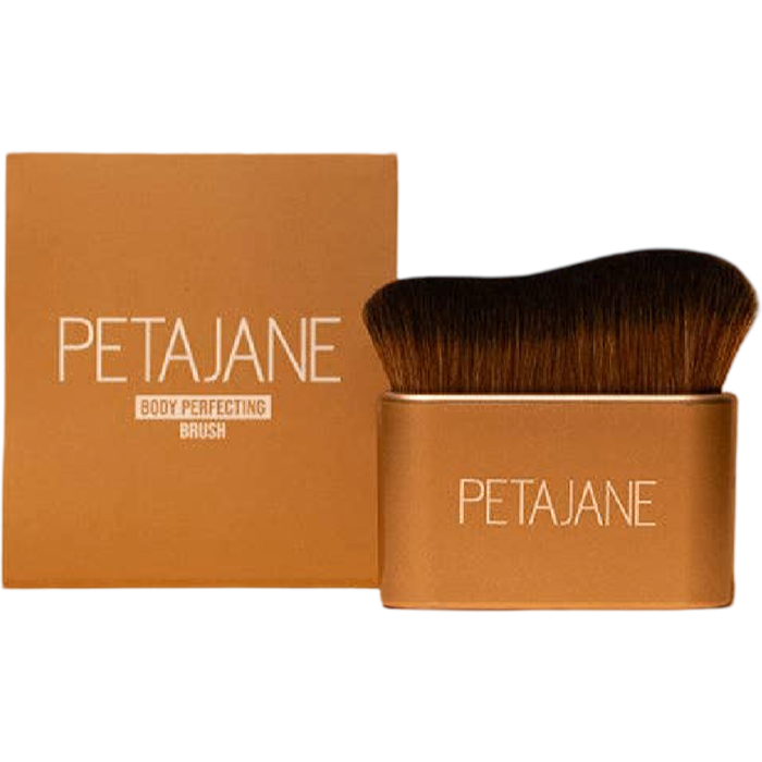 Petajane body perfecting brush with brown handle and black bristles on a white background