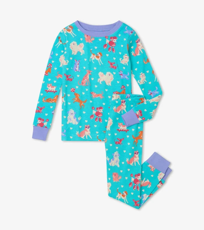 Hatley girls Playful Puppies organic cotton pajama set in Aqua/Lilac with long sleeves and matching pants.