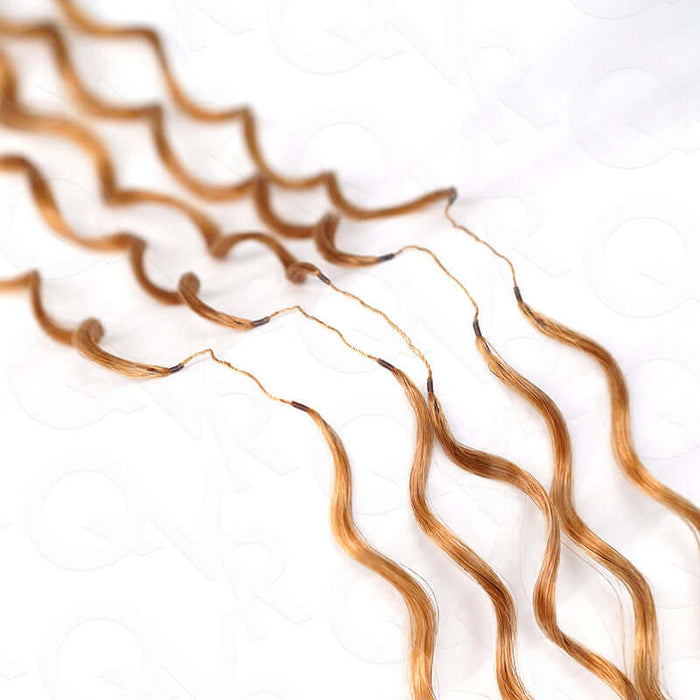 strands of honey blonde body wave crochet hair extensions with invisible knots
