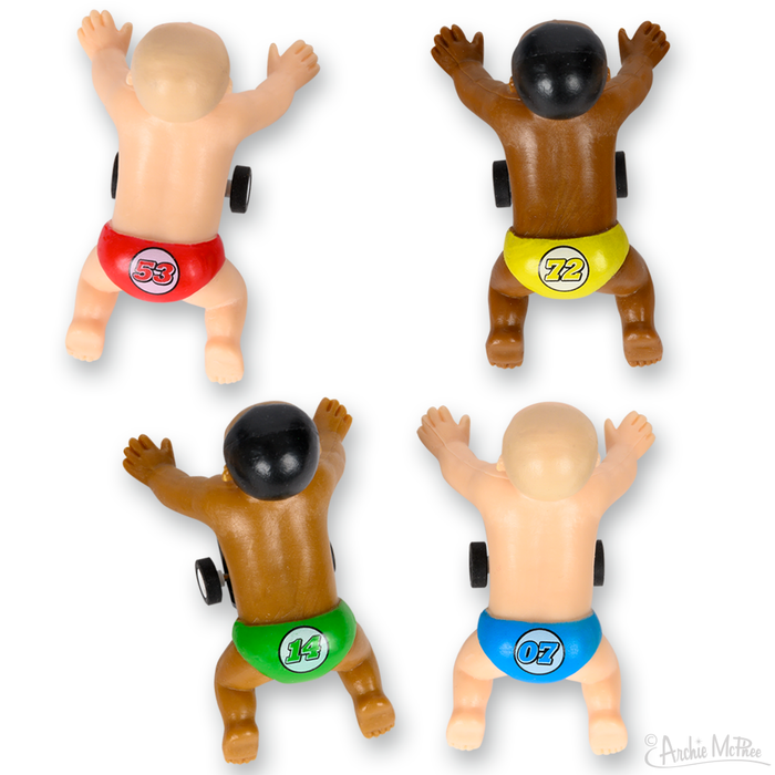 The product "Racing Babies" features four crawling figurines with various skin tones and colored diapers, crafted from soft vinyl and plastic, viewed from above on a white background.
