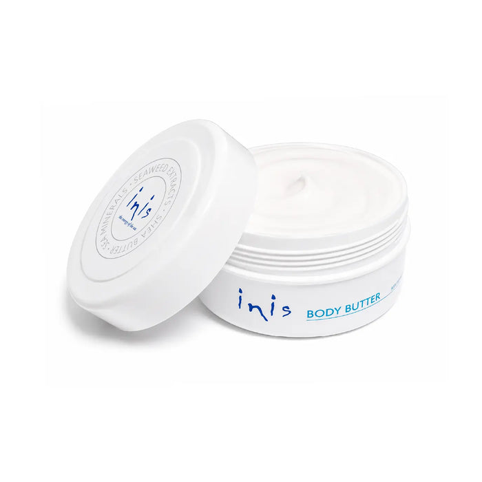 Inis body butter jar with lid on a white background