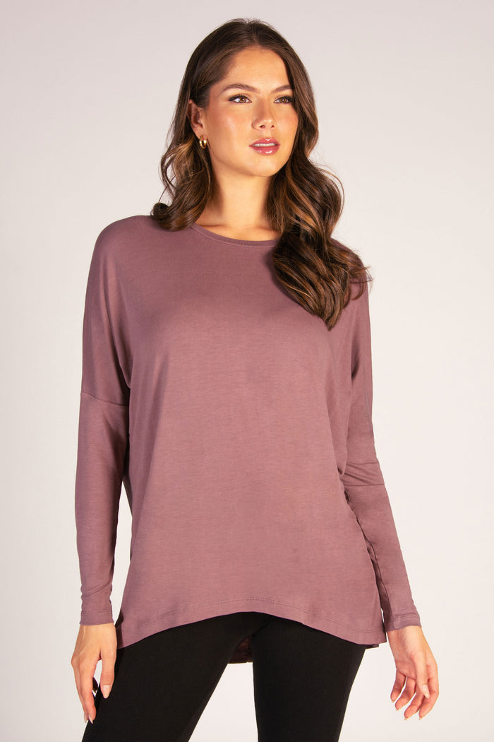 Kianna Louise wearing raisinette long sleeve jersey top, the prefect day to night essential for women.