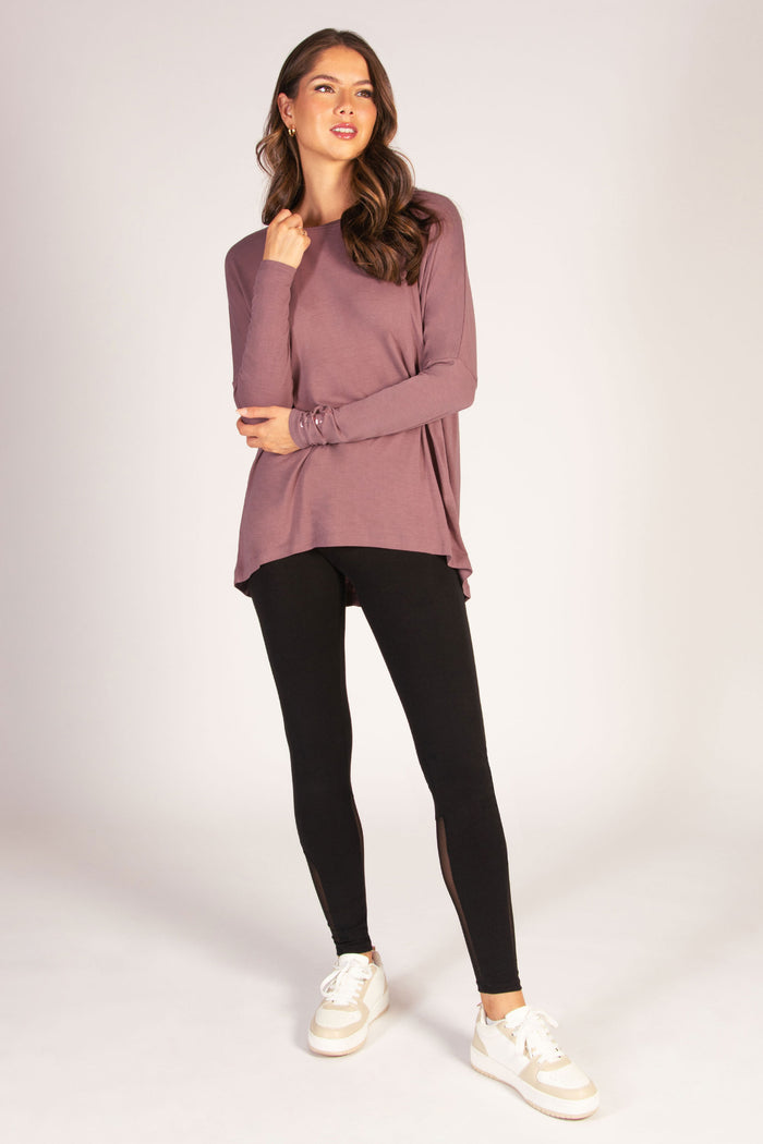 Women's dark brown jersey long sleeve top with dipped back, perfect for day to night outfits.