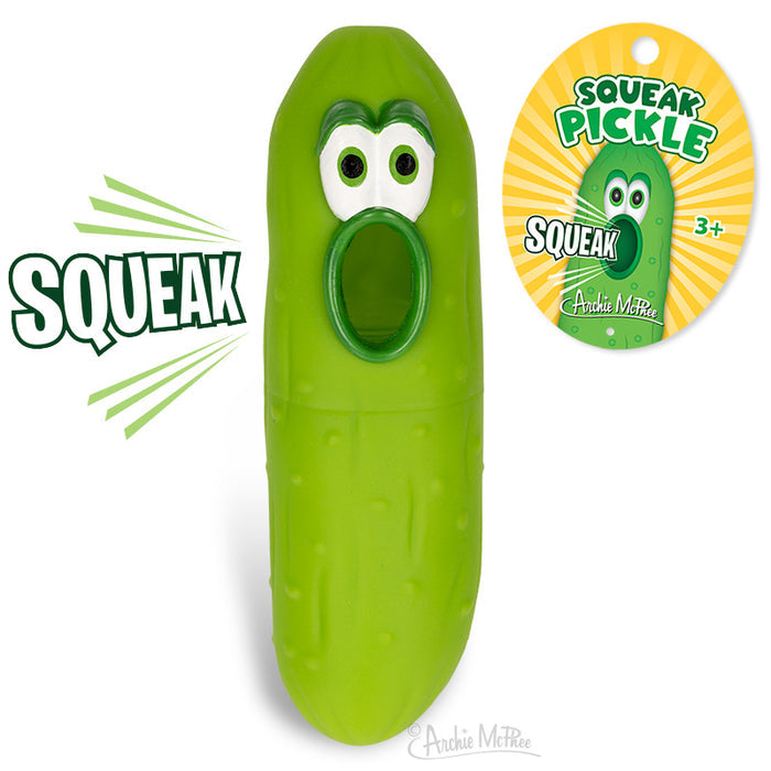 This Squeak Pickle, featuring a vibrant green hue with cartoon eyes and a wide-open mouth, is the ideal toy for playful kids. The packaging highlights its exclusive label and it's appropriate for ages 3 and up. It's also part of the fun-filled Archie McPhee collection!