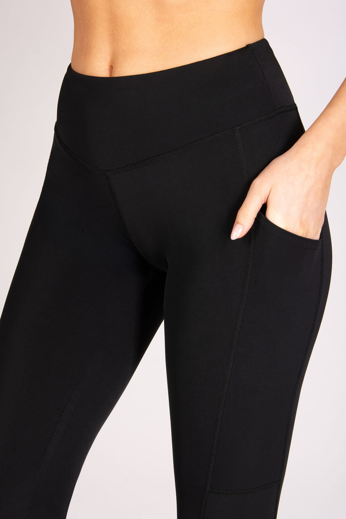 Women's super soft stretchy gym leggings with side pockets for accessories and wide elasticated waistband