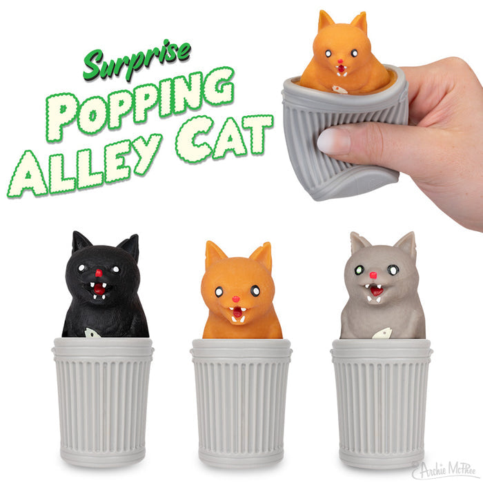 A hand squeezes a gray Surprise Popping Alley Cat trash can, causing an orange alley cat to pop out in surprise. Below, two more startled cats peek from their own cans.