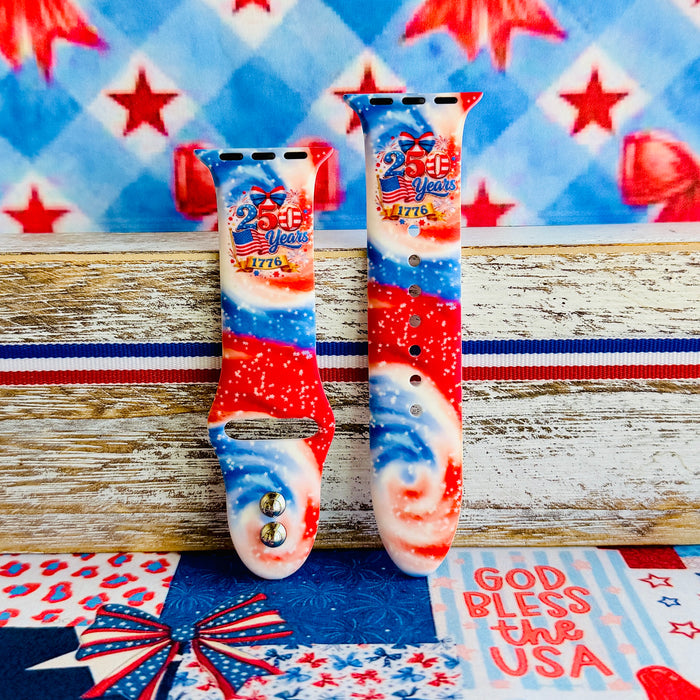 Sweet Freedom 250 silicone Apple Watch band celebrating America's 250th anniversary with "250 Years 1776" emblem, American flag, fireworks, red bow, and red, white, and blue tie-dye swirl with star sparkle, shown displayed and worn on Apple Watch against a patriotic 4th of July backdrop.
