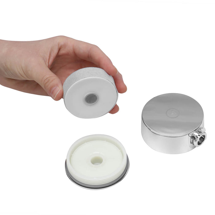 Hand holding Tappwater Tap Water Filter, showing the inside.