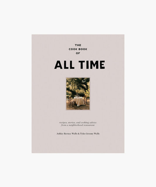 Cookbook cover titled 'The Cookbook of All Time' with a photo of a table outdoors. | SW Home