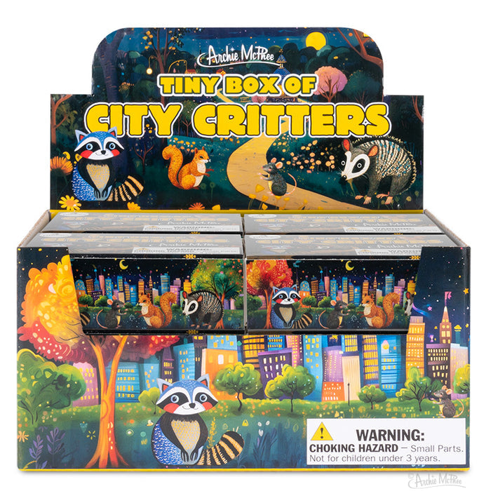 Display box for Tiny Box of City Critters with vibrant illustrations of animals and a small parts choking hazard warning.