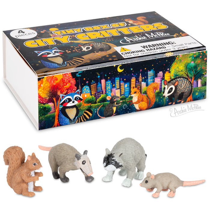 Figures of a squirrel, opossum, raccoon, and rat are displayed in front of the vibrant Tiny Box of City Critters.