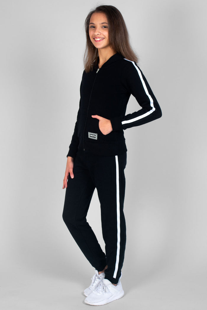Girl wearing black Unisex Kids' Stripe Joggers and matching Zip Jacket